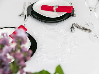Empty plates prepared for meal in restaurant