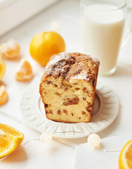 Christmas cupcake with oranges on a white background