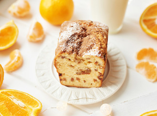 Christmas cupcake with oranges on a white background