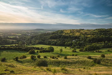 Stunning landscape image of view over English countryside during Summer sunset with soft light