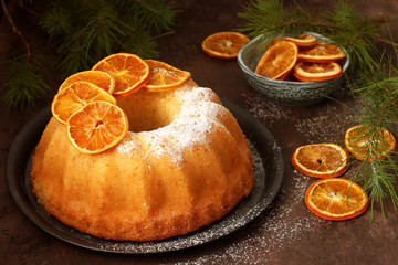 Bundt orange cake with icing sugar