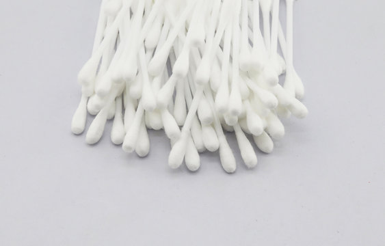 Many Cotton swabs  on white background. 