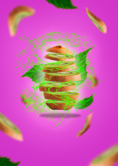 Kiwi levitation on a purple background with leaf levitating. High resolution image. Health concept and healthy food on levitation