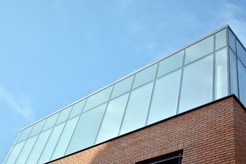 Modern office building detail, glass surface