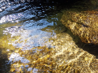 clear water in the river over the texture