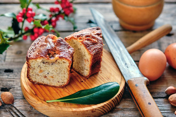 Almond sponge cake with rustic background