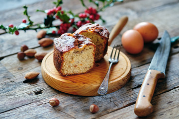 Almond sponge cake with rustic background