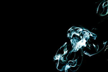 Smoke on a black background. Abstraction.