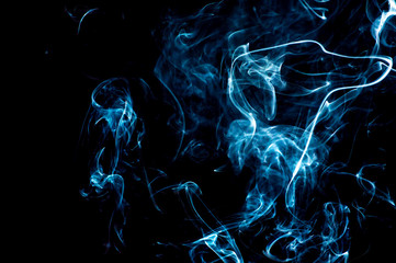 Smoke on a black background. Abstraction.