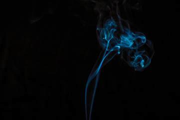 Smoke on a black background. Abstraction.