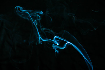 Smoke on a black background. Abstraction.