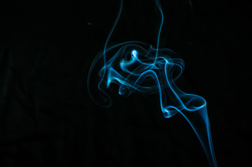 Smoke on a black background. Abstraction.