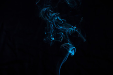 Smoke on a black background. Abstraction.