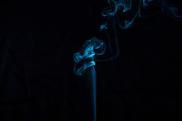 Smoke on a black background. Abstraction.
