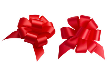 A set of two bows of the same shape photographed from different angles made of red bright shiny satin ribbon isolated on a white background. Design elements, clipping path.