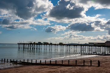 Dark clouds above Teignmouth Pier in South Devon