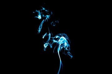 Smoke on a black background. Abstraction.