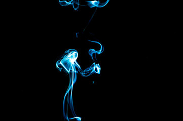 Smoke on a black background. Abstraction.