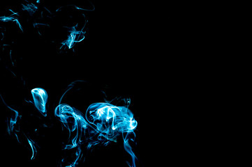 Smoke on a black background. Abstraction.