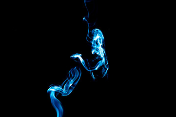 Smoke on a black background. Abstraction.