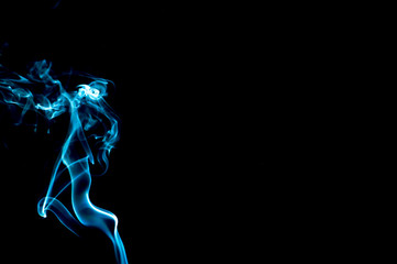 Smoke on a black background. Abstraction.