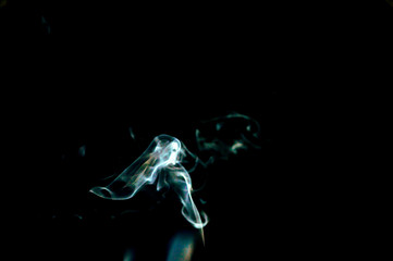 Smoke on a black background. Abstraction.