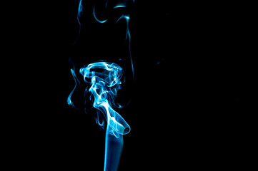 Smoke on a black background. Abstraction.