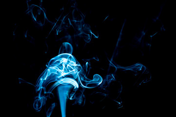Smoke on a black background. Abstraction.