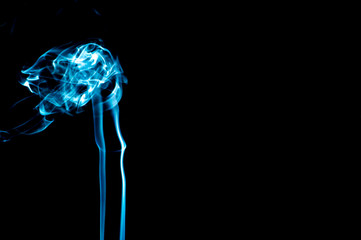 Smoke on a black background. Abstraction.