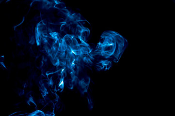 Smoke on a black background. Abstraction.