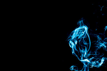 Smoke on a black background. Abstraction.