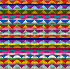 Bright, colorful geometric background. Imitation knitting pattern, jacquard. Seamless decorative backdrop. Handmade