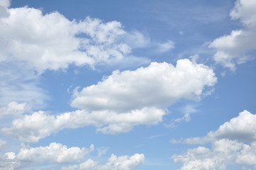 Naklejka na ściany i meble blue sky with clouds close up. Summer
