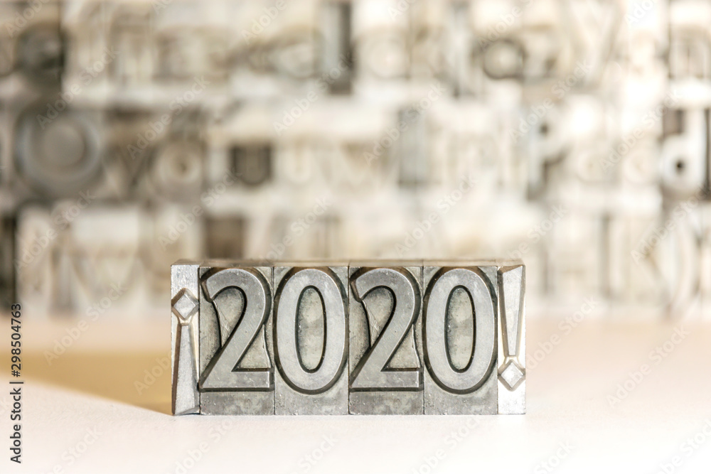 Fototapete happy new year 2020 on background with press types between exclamation marks