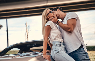 Couple near car