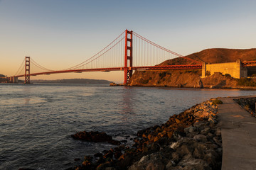 Sun rising on the Golden Gate bridge seen from Fort Baker in the early morning