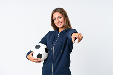 Young football player woman over isolated white background