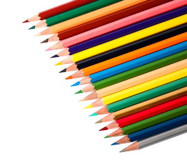 Different color pencils on white background. School stationery