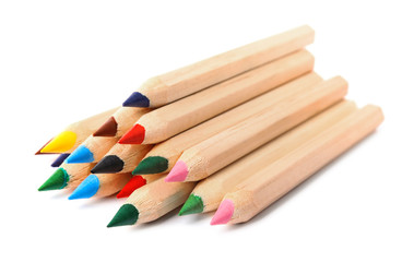 Different color pencils on white background. School stationery