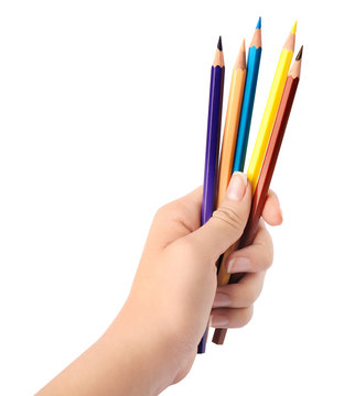 Woman holding bunch of color pencils on white background, closeup
