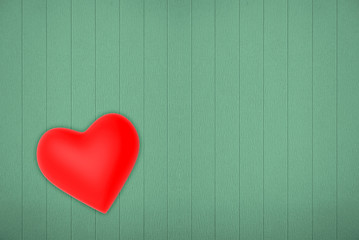 Red heart on green wood panels wall background.