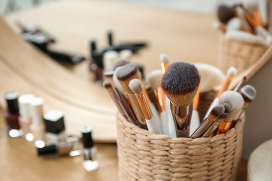 Brushes on dressing table in makeup room