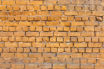 texture of an old yellow brick wall