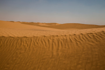 Yellow and fine sand dune in the desert in Tunisia.