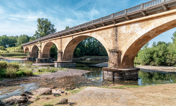 Bridge Vitrac (Pont de Vitrac) over the river Dordogne, Aquitaine, France. Arch stone bridge built in 19th century.