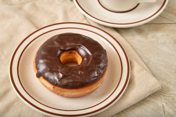 Gourmet chocolate frosted donut