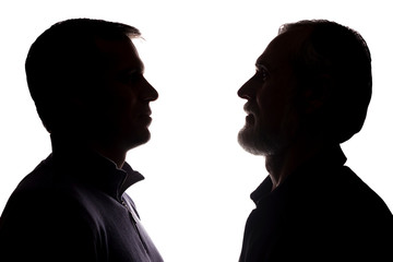 Face portrait old father and adult son opposite - silhouette, family