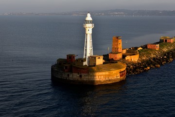 lighthouse marking the entrance to the harbour