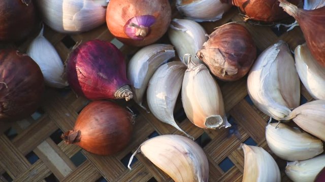 Garlic clove or garlic bulb on  wooden background.