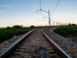 Obraz premium train tracks, level crossing and moving rail